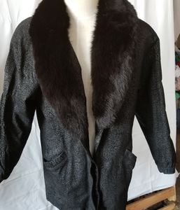 Leather coat with fox collar